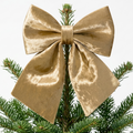 Doré - Nœud de Noël, posé sur une branche de sapin